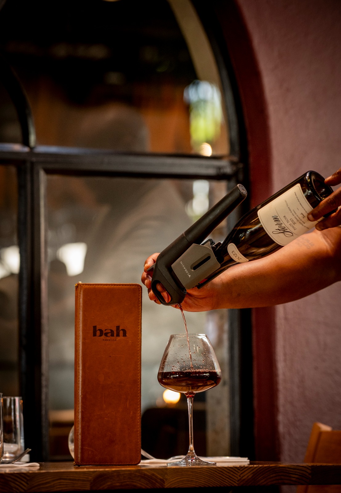 Coravin pour of rare wine by the glass at BAH Parrilla