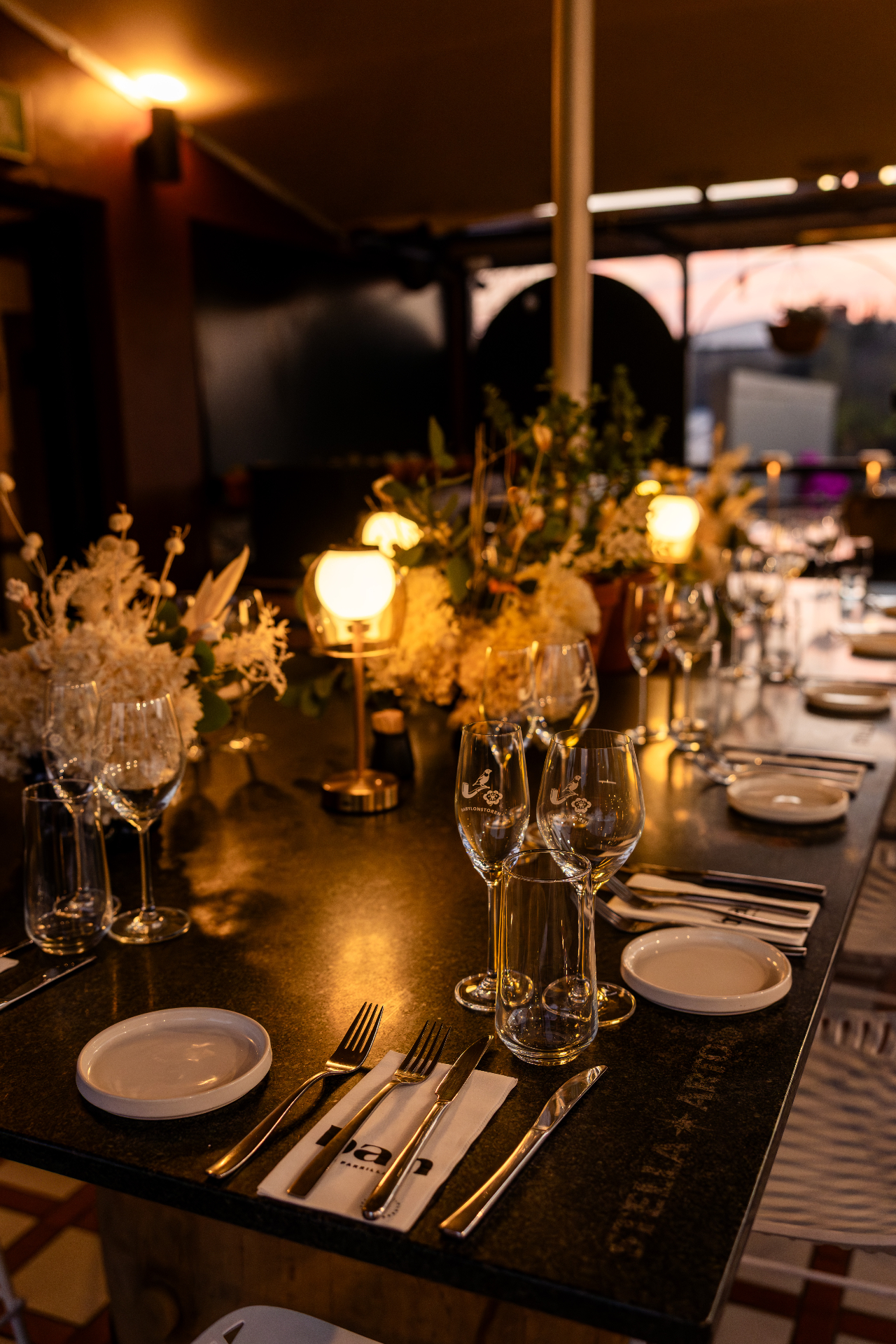 Long table set for a private dinner on The Terrace