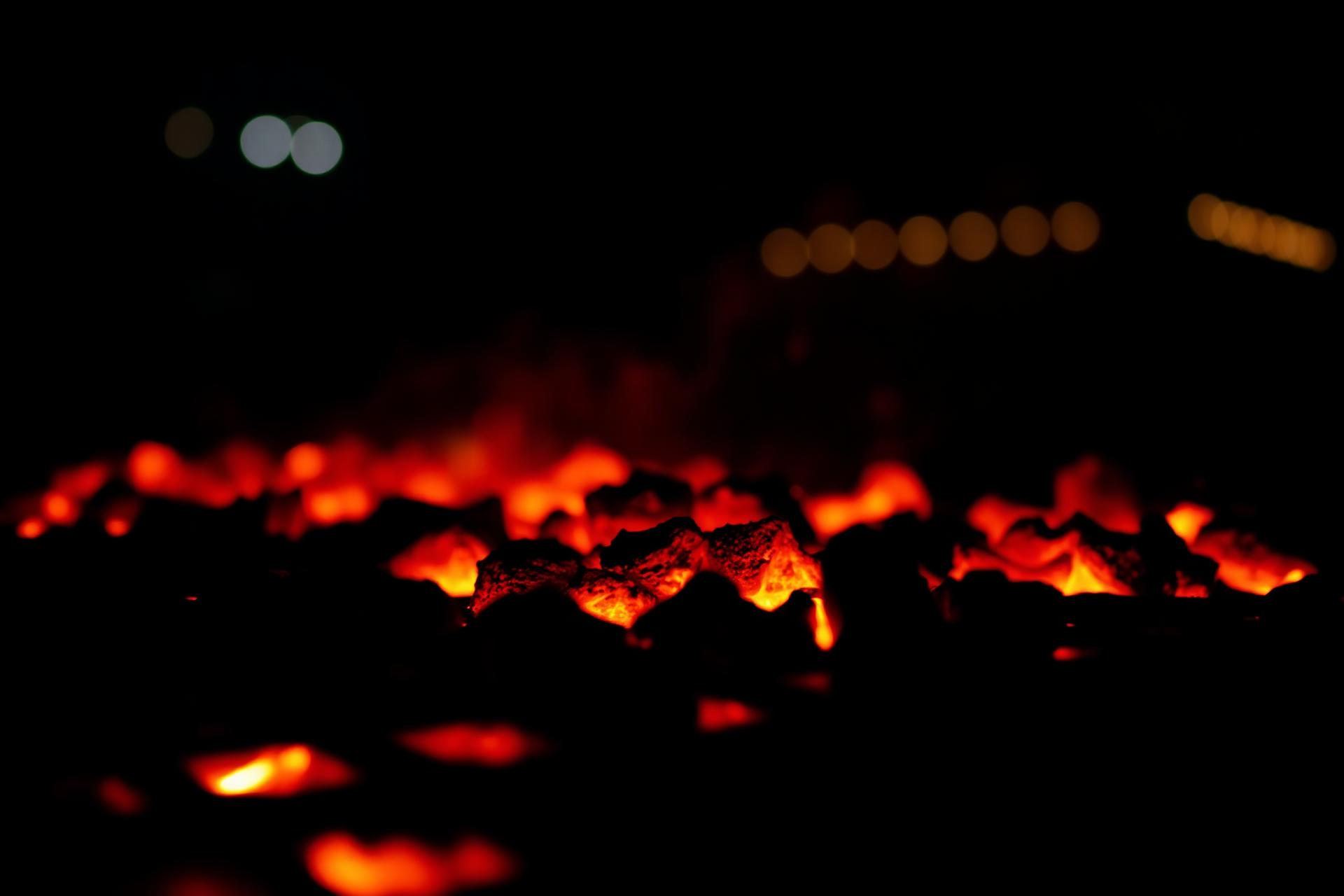 Glowing embers on the parrilla